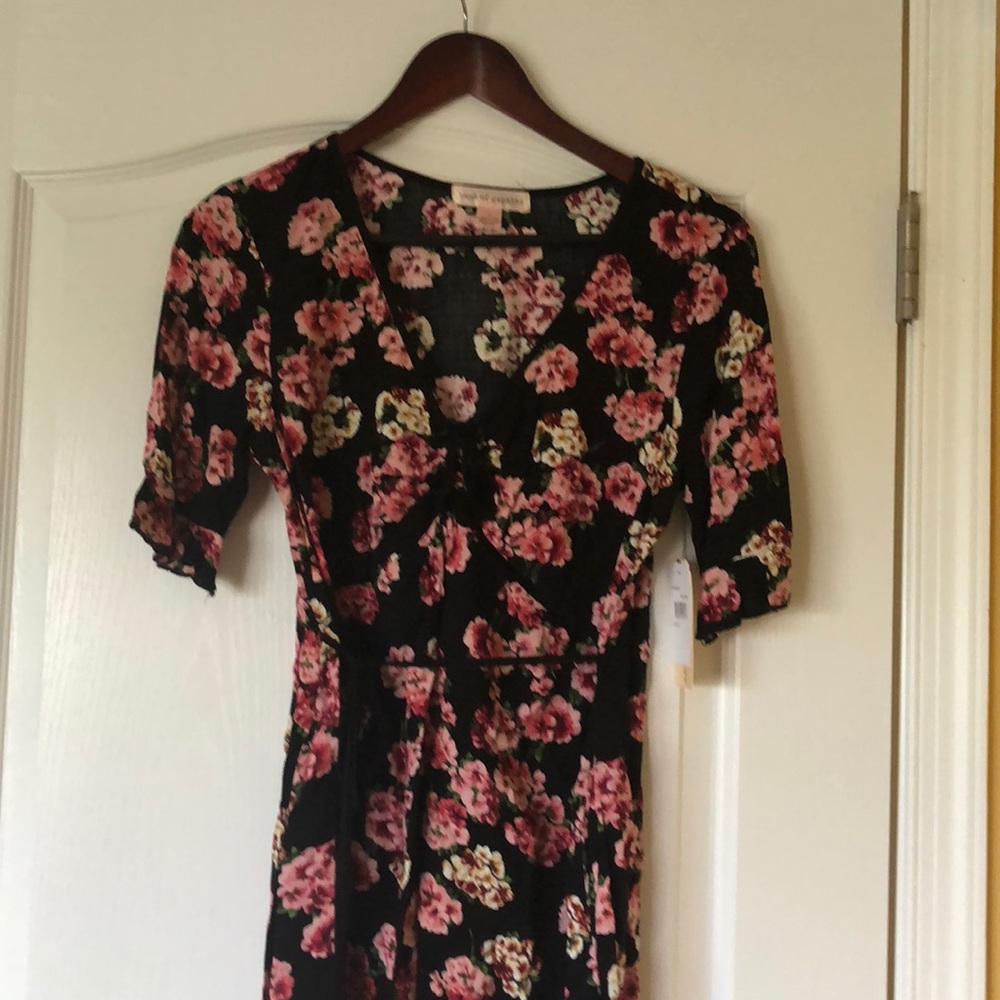 Short sleeved floral dress. New with tags.